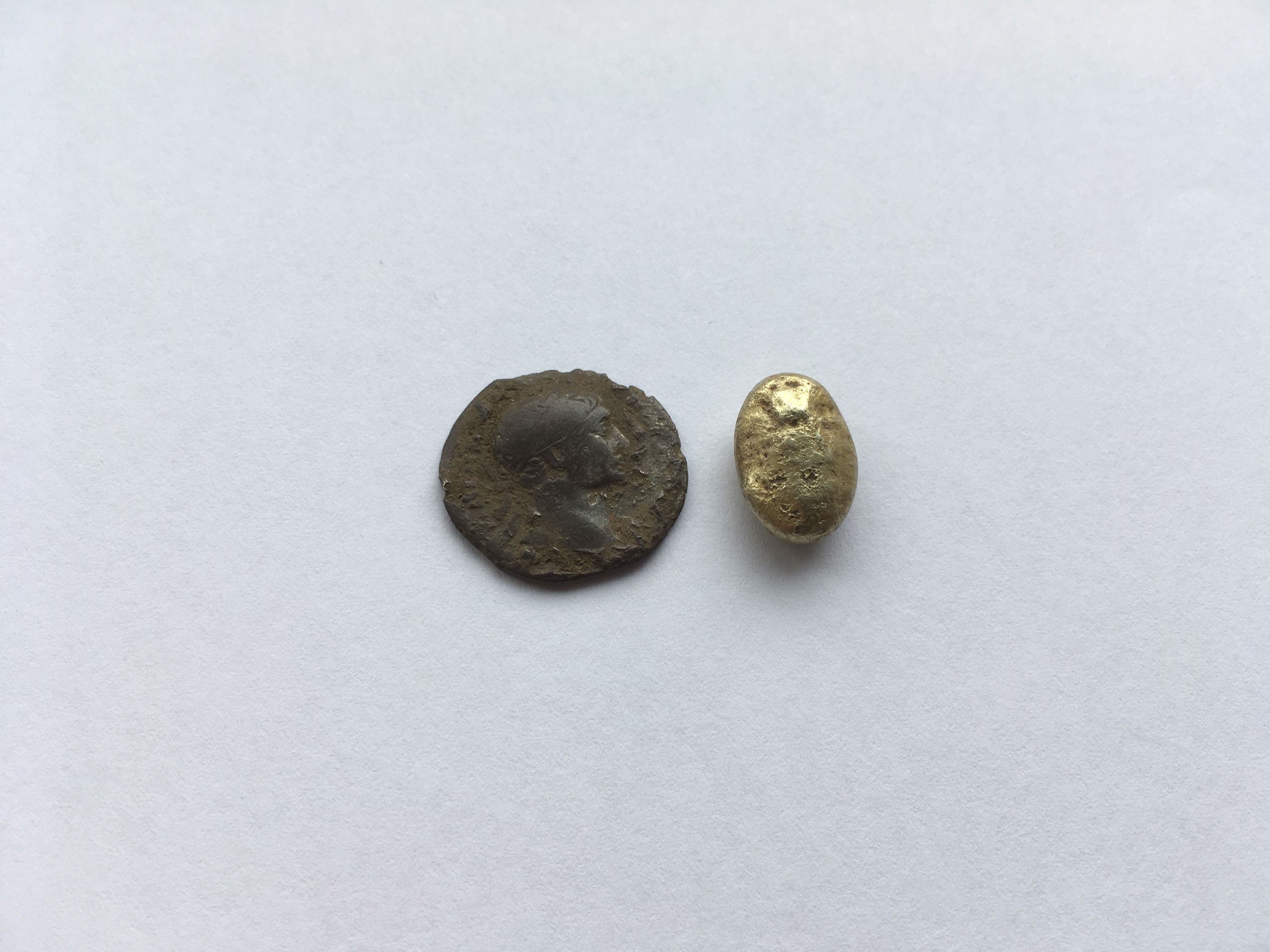 Arkæologisk fund, guldperle og mønt